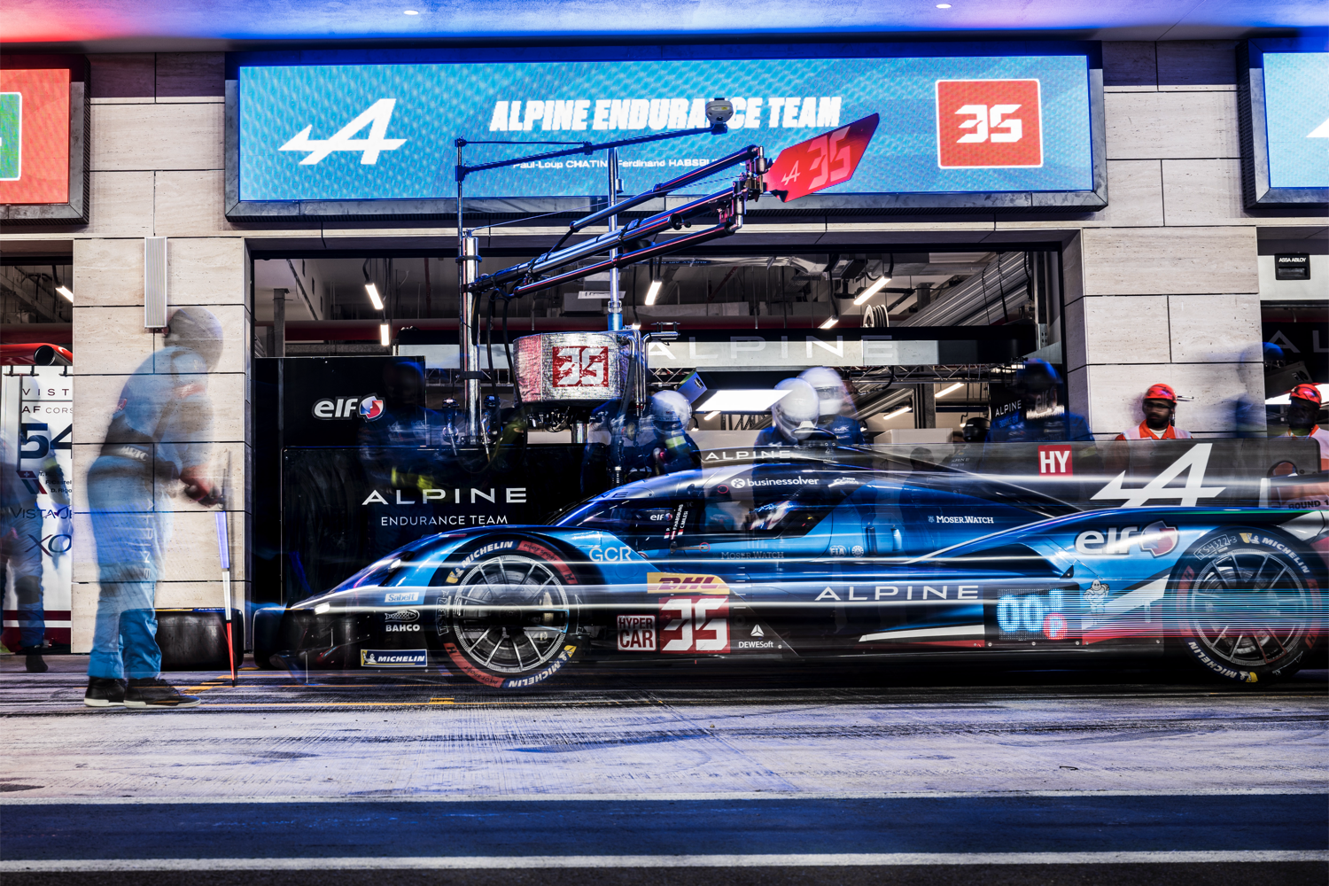 The Alpine crew servicing the #35 Alpine in a pitstop at Qatar's Lusail International Circuit.