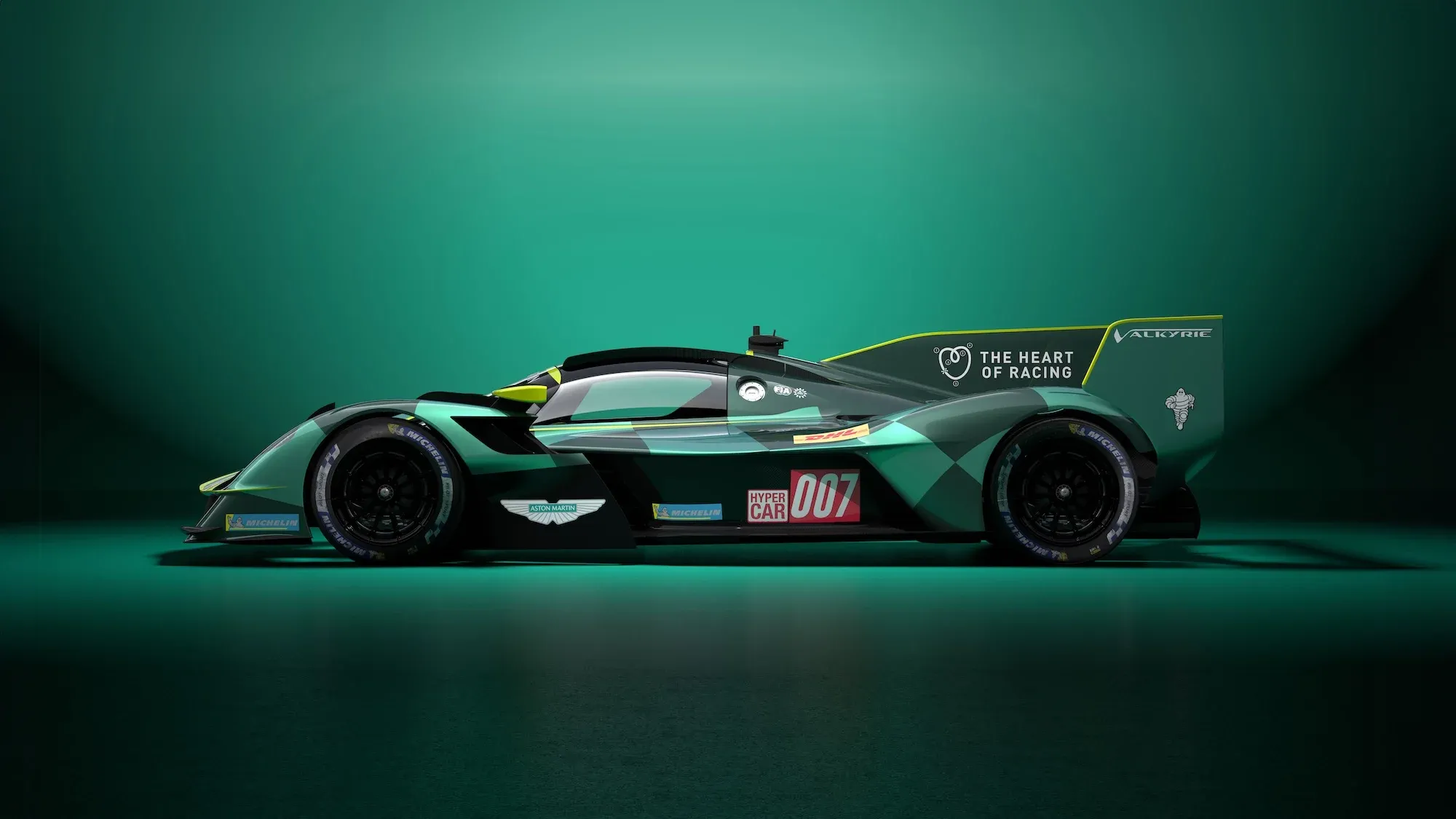 A side view of the Aston Martin Valkyrie AMR-LMH, in green WEC livery.